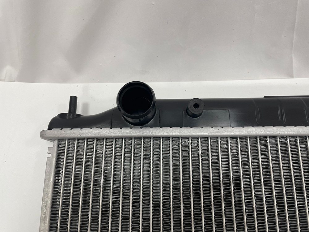 for Nissan Bd22/Td27 Mt Auto Parts Cooling System Radiator OEM 21410-Vk505