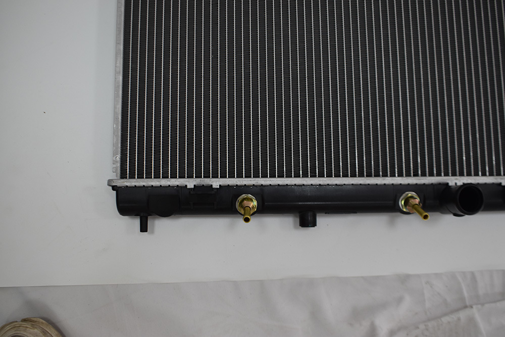 Aluminum Auto Parts for Nissan Car Tiida′ 04′ at Cooling System Radiator OEM 21460-ED500