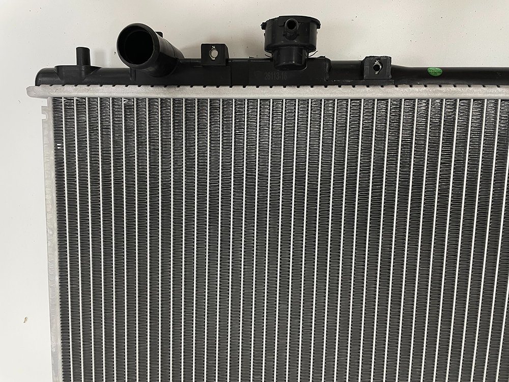 China Manufacturer Wholesale High Quality Auto Aluminum Radiator for Mazda Haima 7160 09 Mt